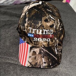 Men’s or Women’s Camo Trump 2020 Cap. One size fits all! Brand new without tags!